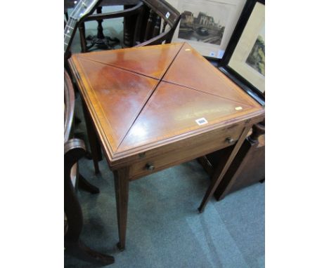 EDWARDIAN ENVELOPE CARD TABLE, with satin wood cross banding and ebony and satinwood stringing, fitted lower drawer on square