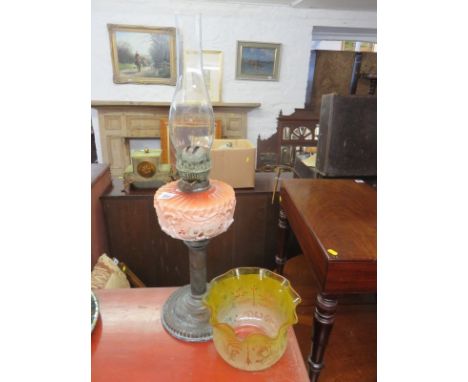 OIL LAMP, Victorian oil lamp with opaque glass reservoir with enamelled floral decoration and a yellow tinted shade, 25" high