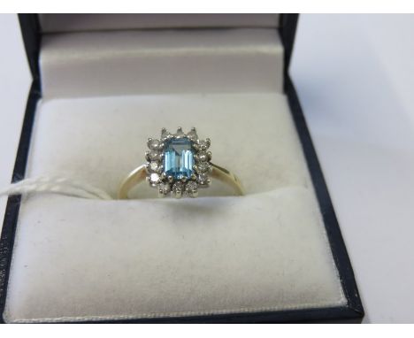 AQUAMARINE DRESS RING, cluster ring on a 9ct yellow gold mount, size I/K