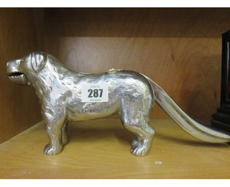NUT CRACKER, a chromed cast metal dog design nut cracker