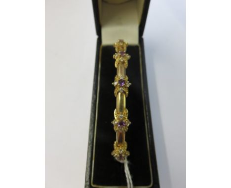 AMETHYST BANGLE, 9ct yellow gold bangle set 5 amethysts 