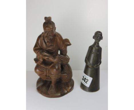 ETHNIC, a carved treen powder flask in the form of a stylized figure; also cherry root carving of a seated workman 