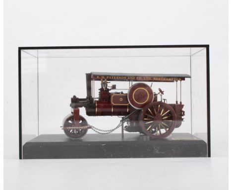 A Bassett-Lowke steam traction Showmans engine model, 15cm length, cased.