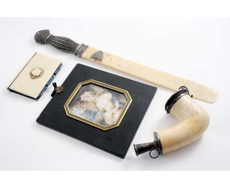 A MIXED LOT: A late Victorian mounted ivory page turner, inscribed; a mounted pipe bowl, an ivory note case and a portrait mi