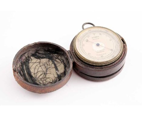 A LATE 19TH / EARLY 20TH CENTURY GILT METAL POCKET ANEROID BAROMETER / COMPASS, signed "E.G. Wood, Optician, 27 Cheapside, Lo