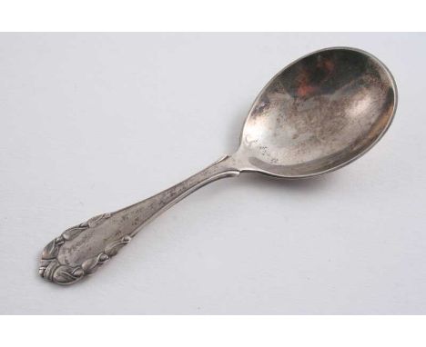 A MODERN DANISH ROSE PATTERN CADDY SPOON by Georg Jensen, with English import marks for London 1931;  4.3"  (11 cms) long;  0