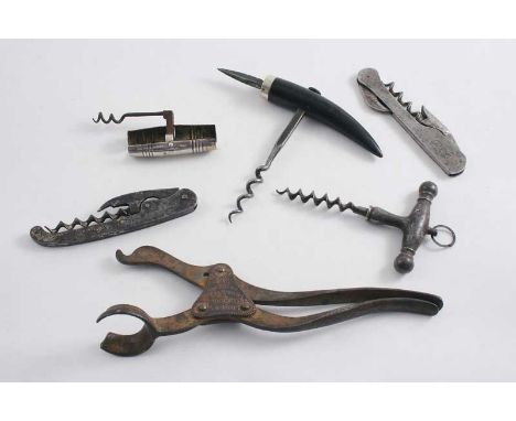A PLATED POCKET CORKSCREW with a fold-out steel worm, a steel corkscrew with wooden handle & spike, two steel pocket tools, a