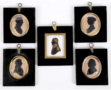 A MID 19TH CENTURY PAINTED SILHOUETTE PORTRAIT OF A GENTLEMAN facing left (on plaster) in a gilt-metal mounted frame with a "
