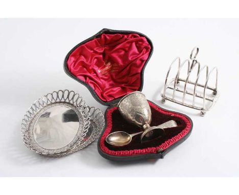 A LATE VICTORIAN ENGRAVED EGG CUP & SPOON by J. Wakely & F.C. Wheeler, London 1898 (in a lined & fitted case) together with a