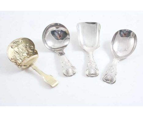 A GEORGE III SILVERGILT CADDY SPOON with a decorative scoop bowl, by Samuel Pemberton, Birmingham 1813 and three other antiqu