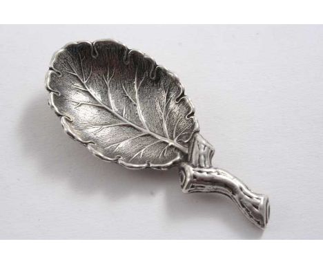 A CONTEMPORARY ITALIAN NATURALISTIC CADDY SPOON in the form of a leaf with a twig handle, by Gianmaria Buccellati;  3.2" (8 c