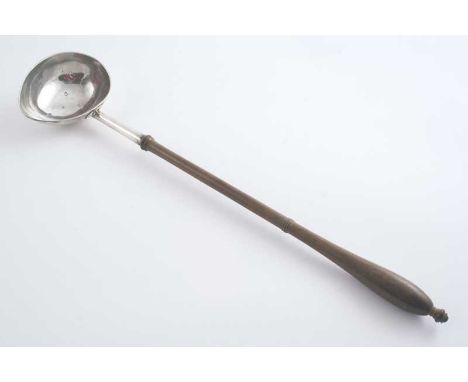 A GEORGE II PUNCH LADLE  with a "goose egg" bowl, inscribed underneath with the scratchweight "3-11", turned wooden handle, b