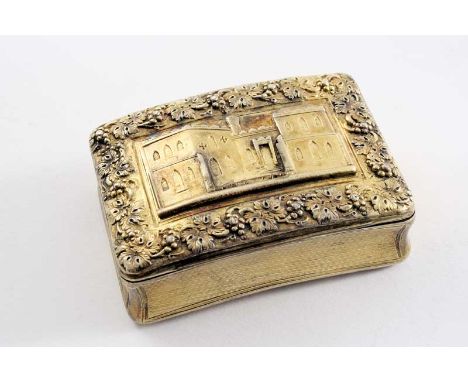A GEORGE III SILVERGILT SNUFF BOX oblong and curved to fit the pocket, with concaved, engine-turned sides & a coat of arms en