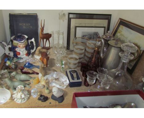 A Mats Jonasson lead crystal seal together with other glass seals, a glass frigger, glass daffodil, glass lemonade set, glass