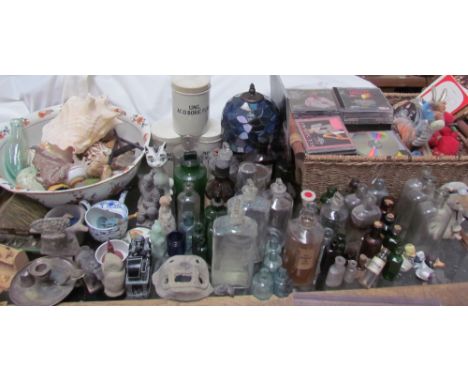 A collection of CD's and DVD's together with pharmacy bottles and jars, Tiffany style table lamp, pottery wash basin, collect