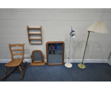 AN ELM ROCKING CHAIR, a wall mirror, a dressing table mirror, two standard lamps, and a wall hanging shelf, condition report: