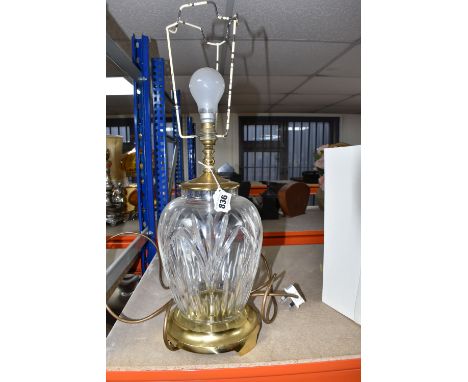 A WATERFORD CRYSTAL CUT GLASS TABLE LAMP on a gilded metal stand, with a Waterford logo to the base of the glass, height 55cm