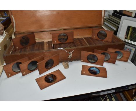 MAGIC LANTERN SLIDES, One Large Wooden Box containing ninety-five finely hand painted, mahogany framed, Magic Lantern Slides 