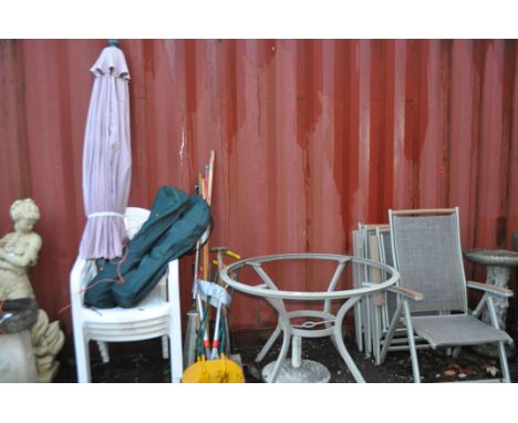 A COLLECTION OF MODERN GARDEN FURNITURE including a round table (glass missing), parasol and  stand, four folding chairs by P