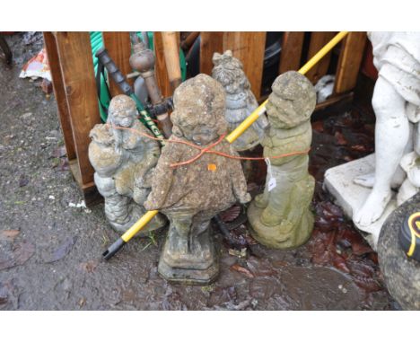 THREE MODERN COMPOSITE GARDEN FIGURES, a plastic figure and garden tools, tallest figure being 60cm high (8)