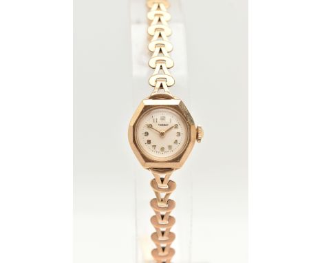 A LADIES 9CT GOLD 'ROTARY' WRISTWATCH, manual wind, round white dial signed 'Rotary', Arabic numerals, gold tone hands, calib