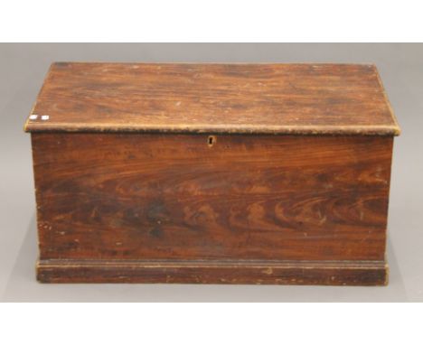 A 19th century scumbled pine trunk. 92 cm wide.