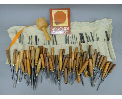 A quantity of woodworking tools  and wood samples. The largest sample 73 cm long.