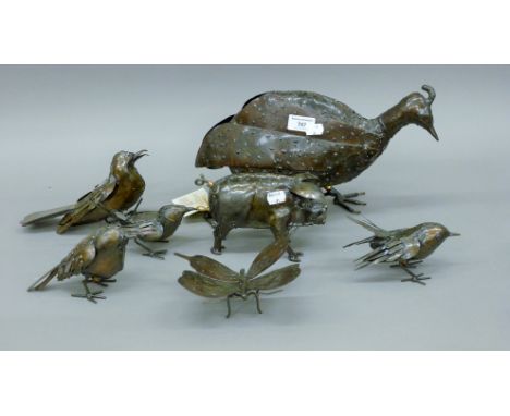 A quantity of modern metal animal sculptures of birds, a pig and a butterfly, five with ring bands for Birdwoods of Zimbawe. 