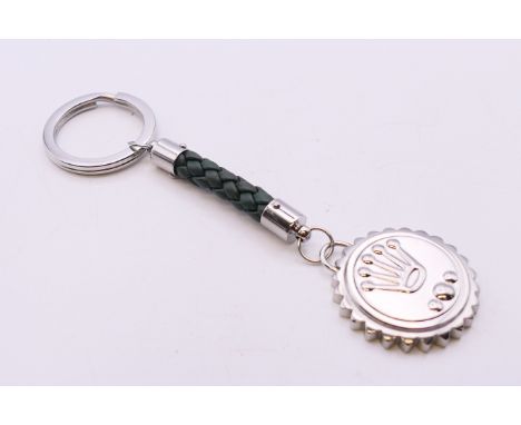 A Rolex Baselworld 2016 keyring, boxed. 13 cm high. 