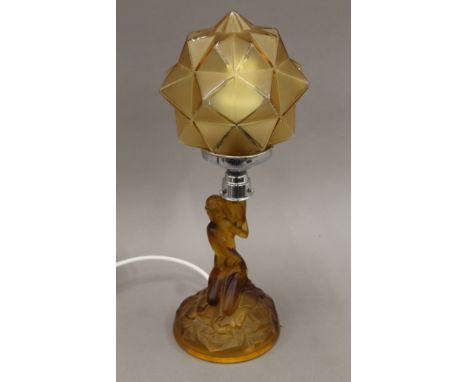 An Art Deco glass lamp of female figural form. 42 cm high.