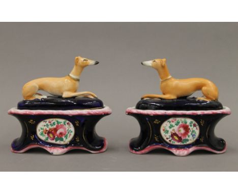 A factory pair of 19th century Staffordshire pottery coursing greyhound lidded ink stands. A left and right well modelled pai