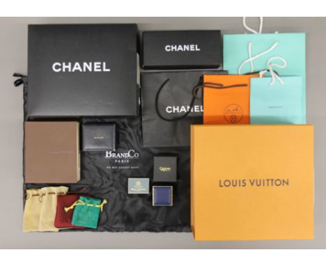 A quantity of vacant designer bags and boxes including Louis Vuitton, Chanel, Tiffany &amp; Co etc. The largest 26 x 25 cm.