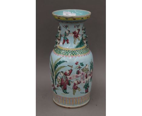 A 19th century Chinese porcelain light blue ground twin-handled vase painted with figures at play. 45 cm high.