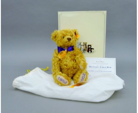 A boxed Steiff 'The Golden Jubilee Bear' with certificate of authenticity. The box 31.5 cm high.