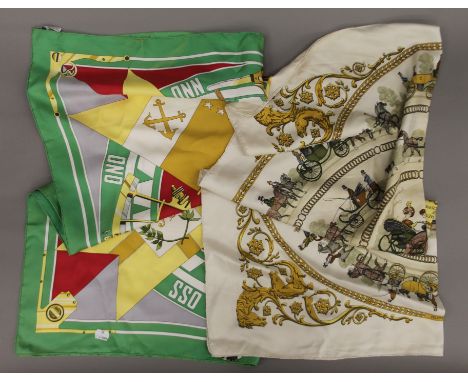 Two Hermes silk scarves. Each 86 cm square.