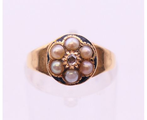 A Victorian 18 ct gold pearl and diamond cluster ring, ring size J.