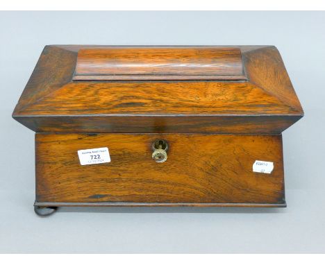 A 19th century rosewood tea caddy. 33 cm long.