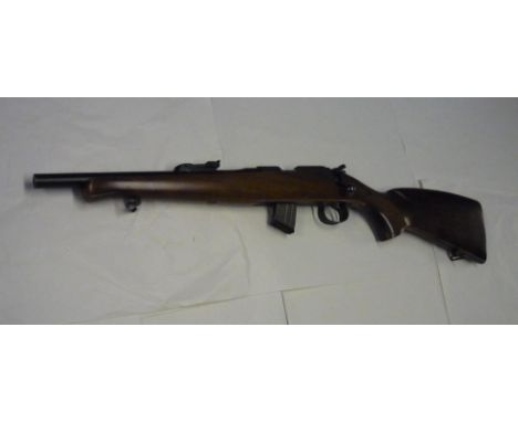 CZ .22 left handed carbine with 13 inch barrel, adjustable rear ladder sights and detachable magazine, serial no. A570564 (se