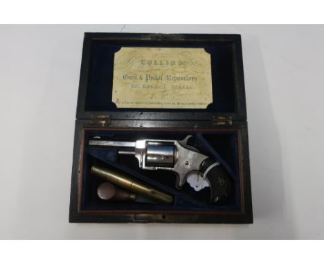Cased Mountain Eagle .32 rimfire revolver, pat March 28th 1871, marked G.W.T &amp; R, with nickle plated finish, 2 1/2 inch o