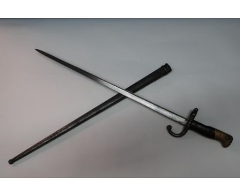 French gras type bayonet with 20 1/2 inch blade, with broad backstrap marked 1878 with two piece wooden and brass grips, quil