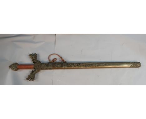 Unusual extremely heavy brass Chinese style presentation sword with 26 1/2 inch blade inscribed 'The His Excellency General S