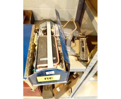 Tool box containing tools and an air staple gun