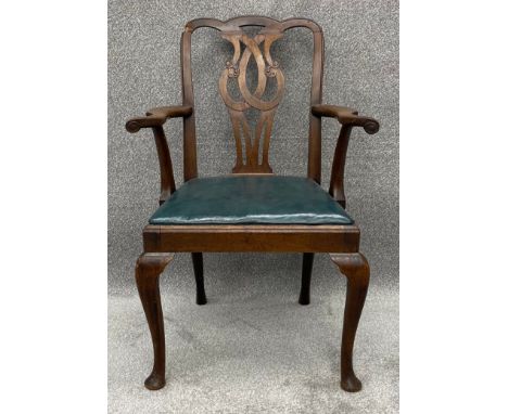 A 19th century mahogany Chippendale style carver chair with leather upholstery. H.99 W.67 D.60cm (Some damage as seen).