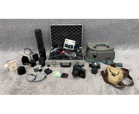 A large collection of photographic equipment to include one Zenith and two Pentax cameras. H.14 W.46 D.33cm (carry case)