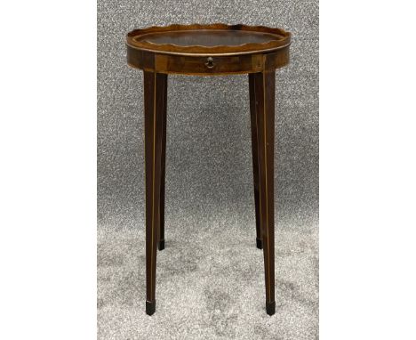 A George III mahogany lamp stand with satinwood inlay fitted with candle slide. H.66cm