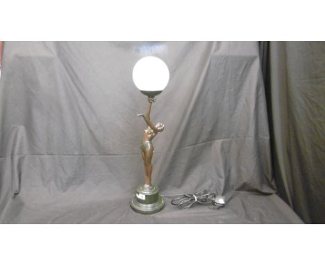 AN ART DECO FIGURAL TABLE LAMP