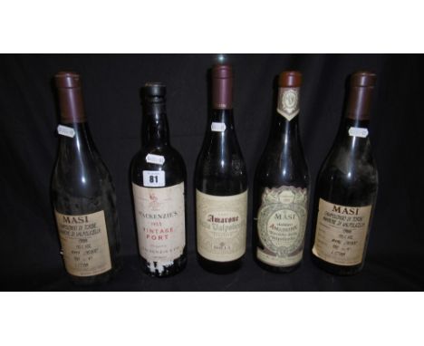 A SELECTION OF FOUR BOTTLES OF FINE ITALIAN RED WINE AND A BOTTLE PORT CONSISTING OF A VINTAGE PART BOTTLE OF MACKENZIE PORT 