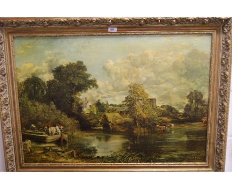 A large decorative gilt framed print