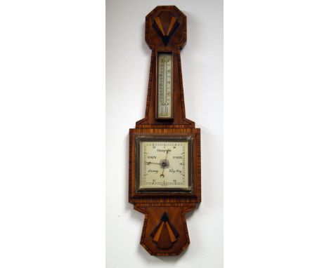 An Art Deco inlaid mahogany aneroid stick-barometer