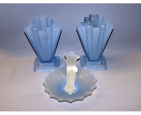 A pair of Art Deco frosted blue styalised glass vases together with a matching dish and a large frosted glass figural stopper